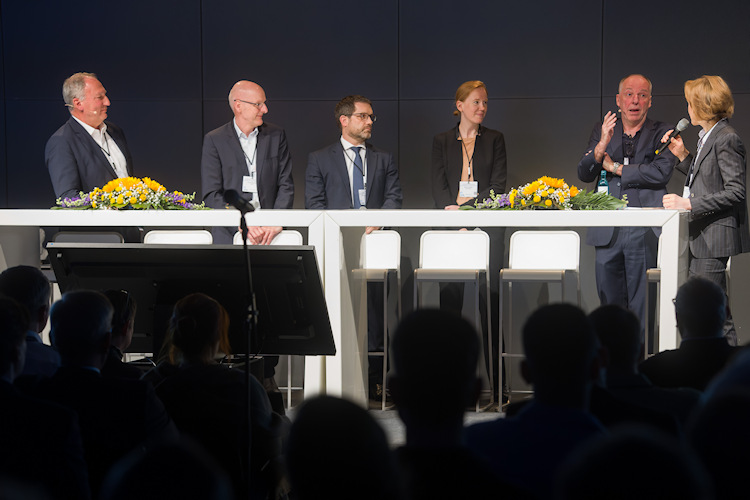 The panel discussion on AI included (from left to right) Debatin, Prof. Jörg Barkhausen, Prof. Konstantin Nikolaou, Prof. Bettina Baessler, Forsting, and Kuhl